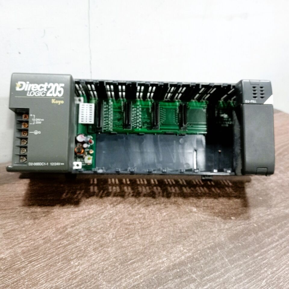 AUTOMATION DIRECT D2-06BDC1-1 I/O BASE DIRECTLOGIC DL205 6-SLOT 25 W DIN RAIL OR PANEL MOUNT EXTERNAL 12/24 VDC REQUIRED